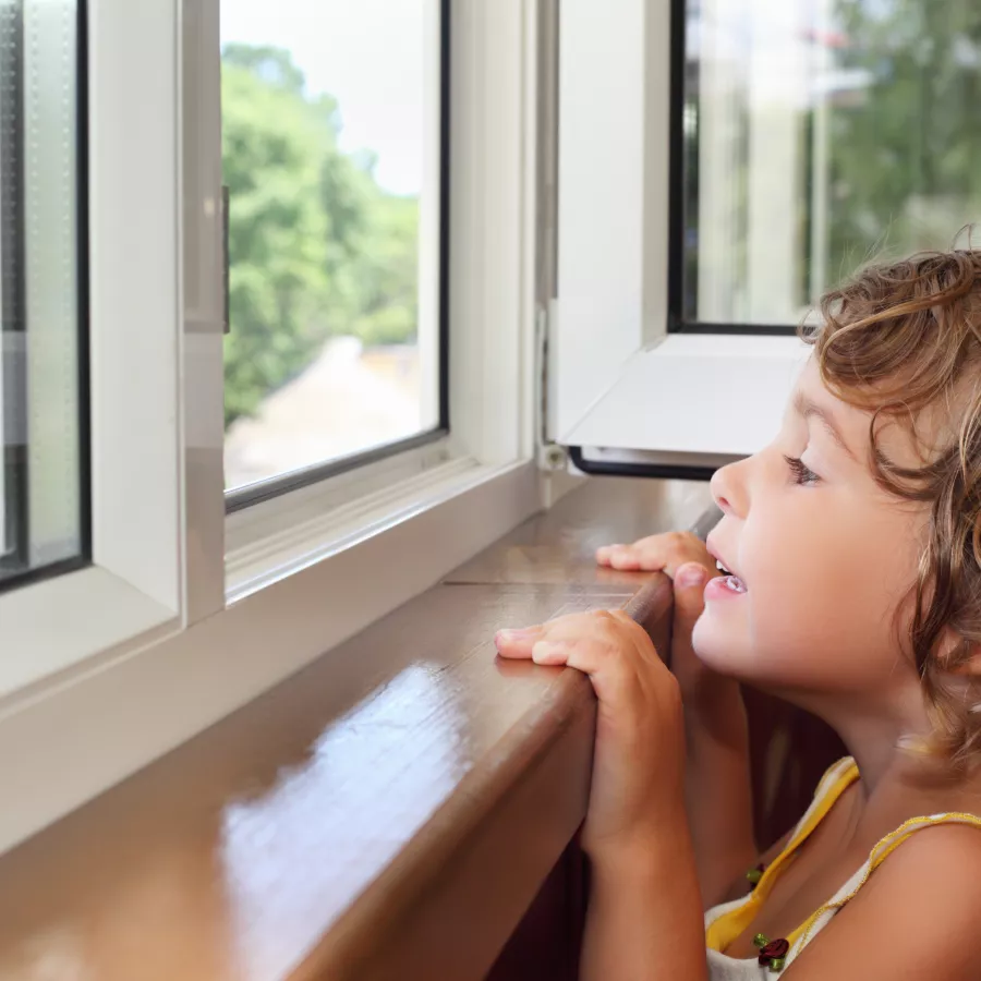 Child by window