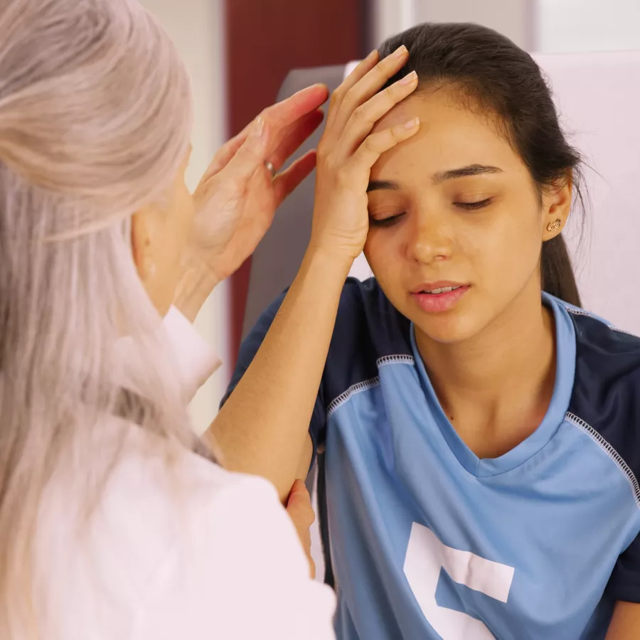 Child being examined after fall